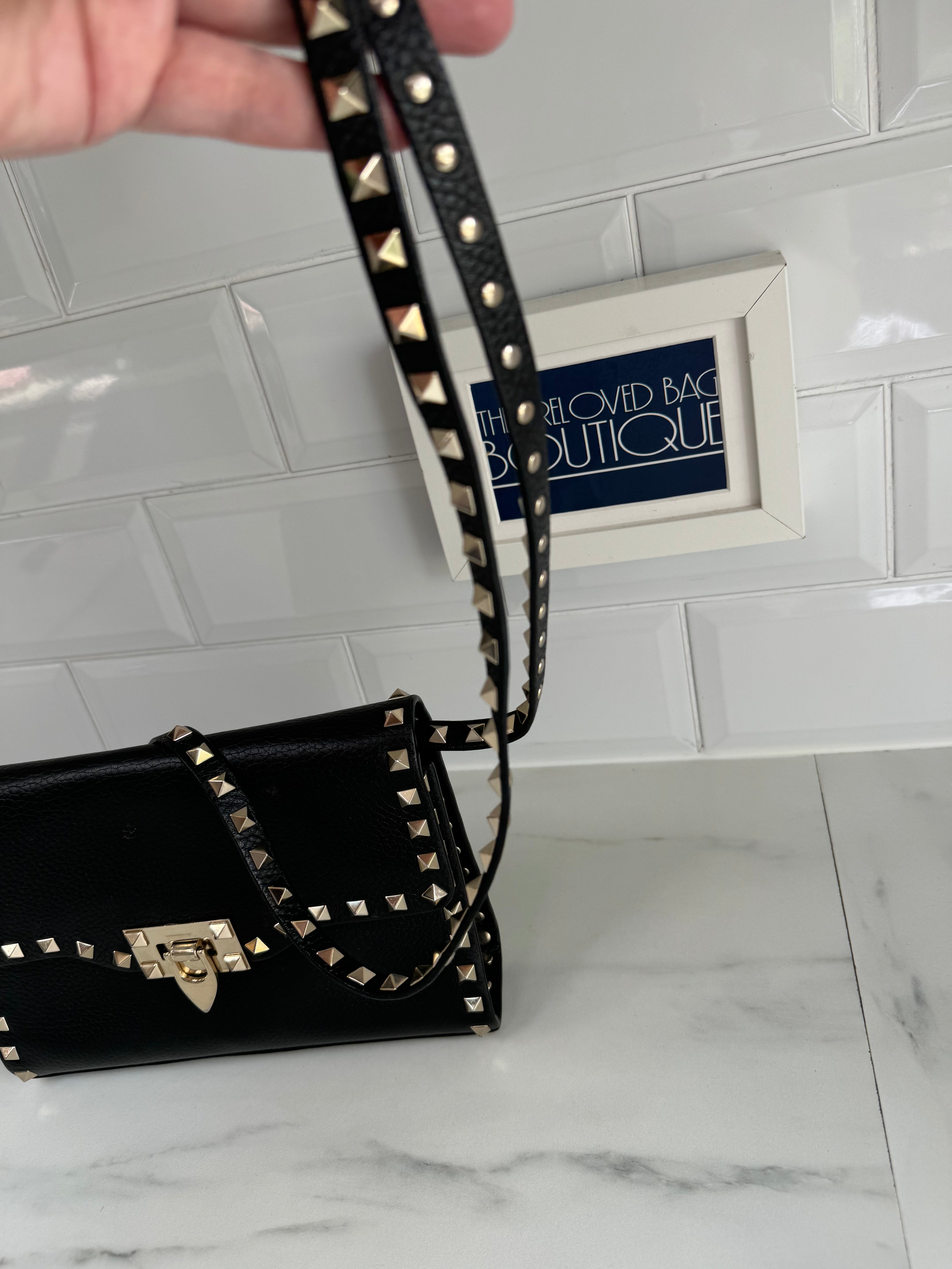 Rockstud mini crossbody bag on sale