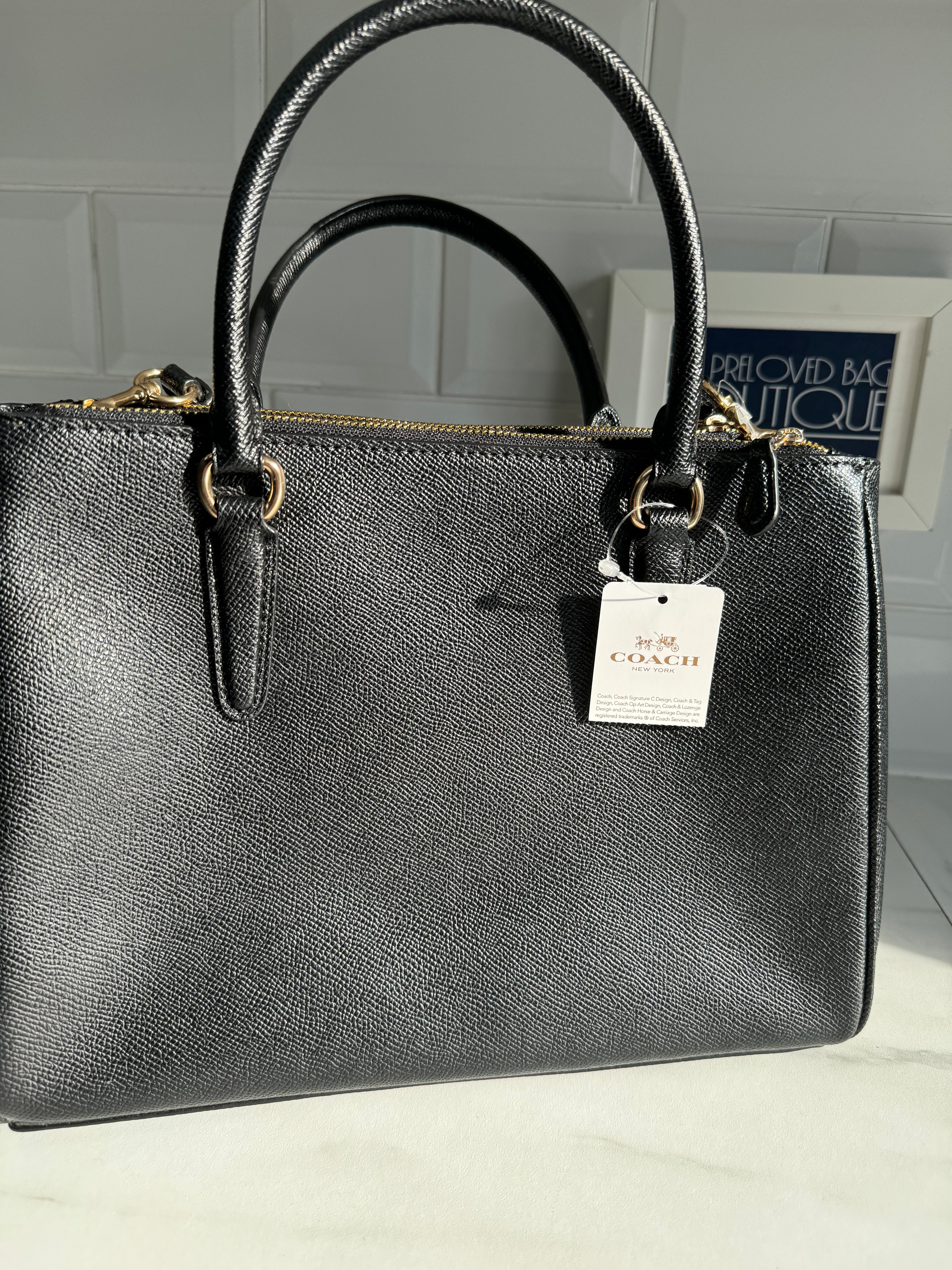 Coach deals Signature Surrey Carryall Satchel in Black.