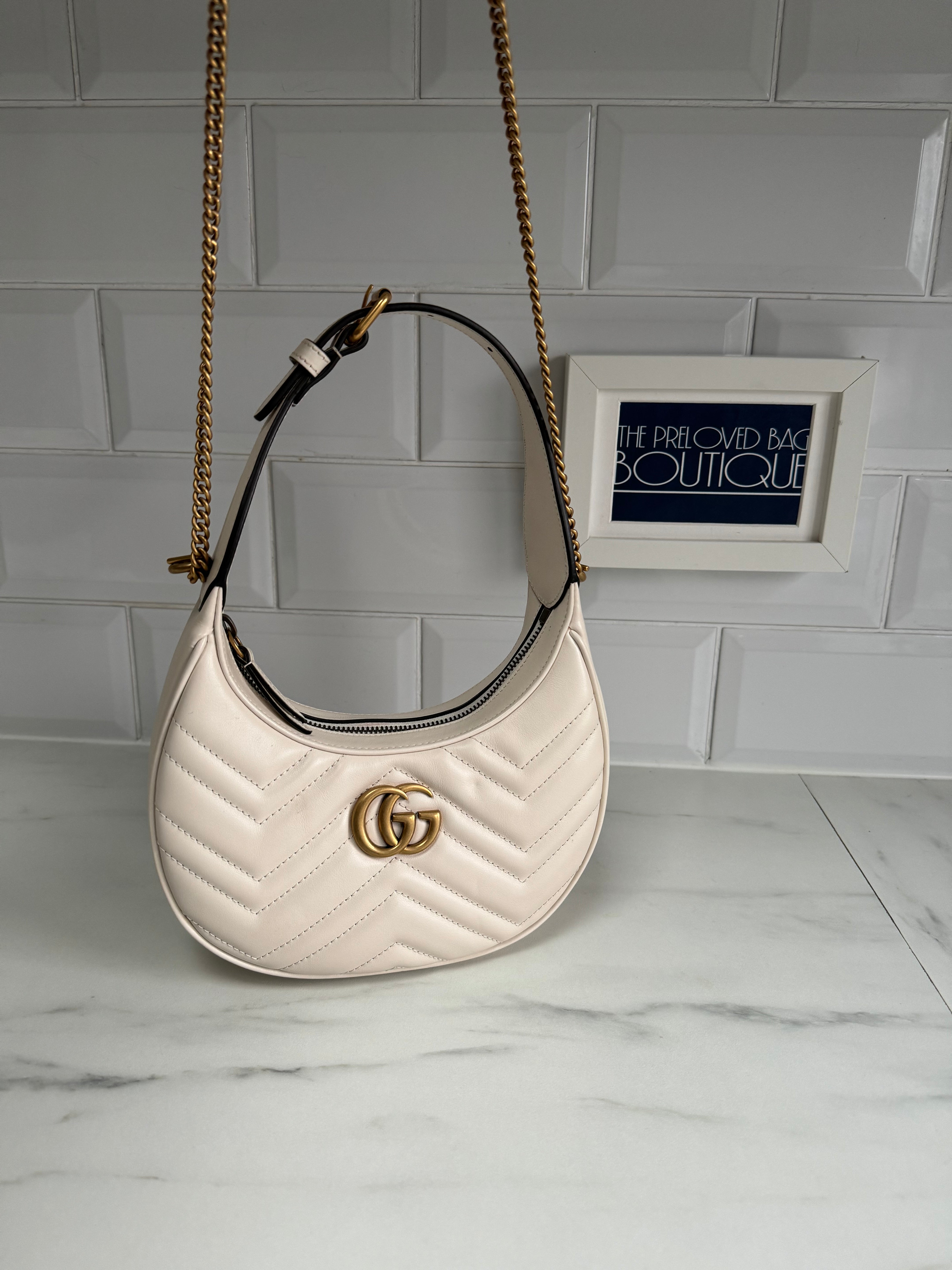 White and discount gold gucci bag