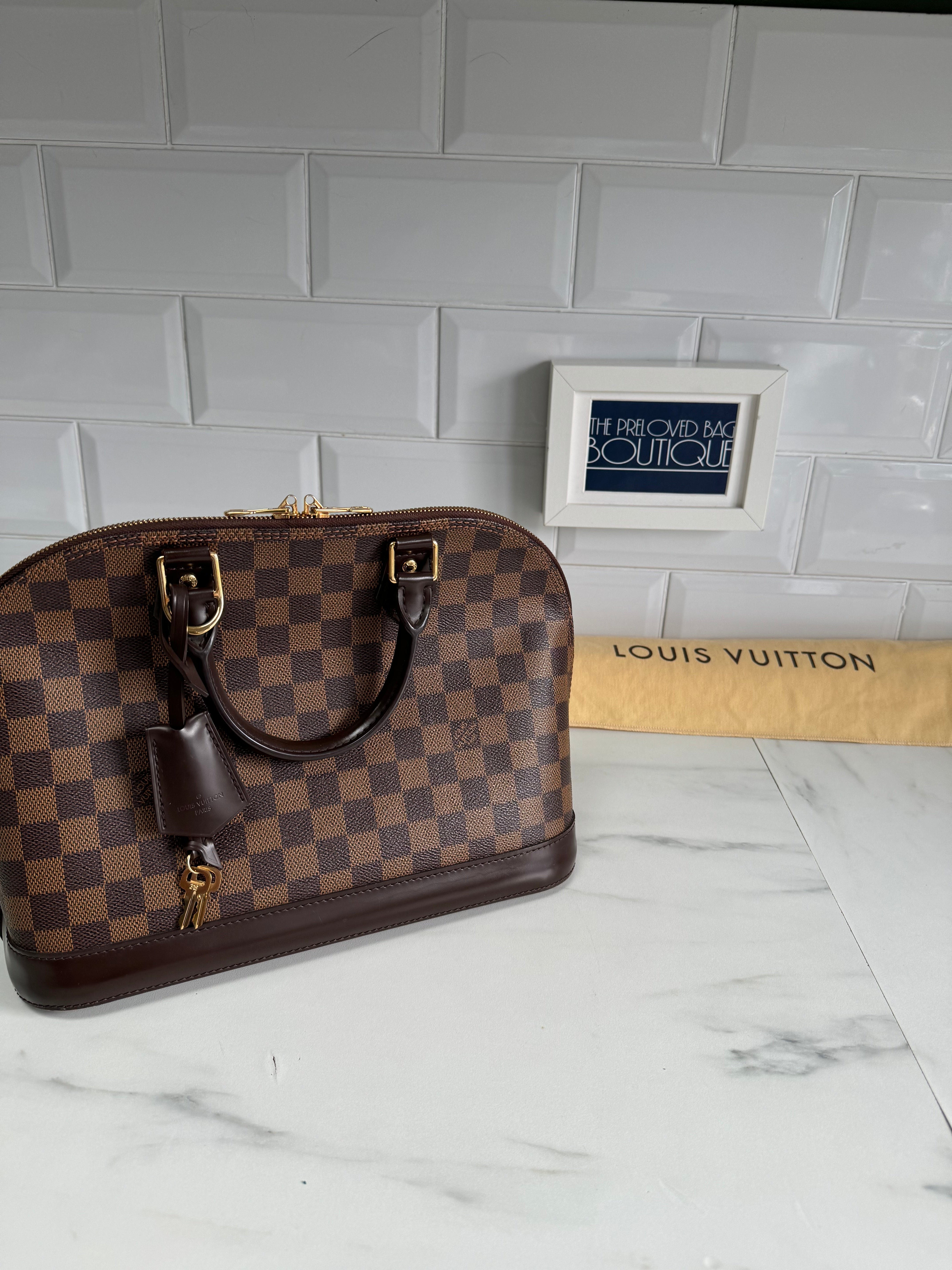 Sac alma clearance pm louis vuitton