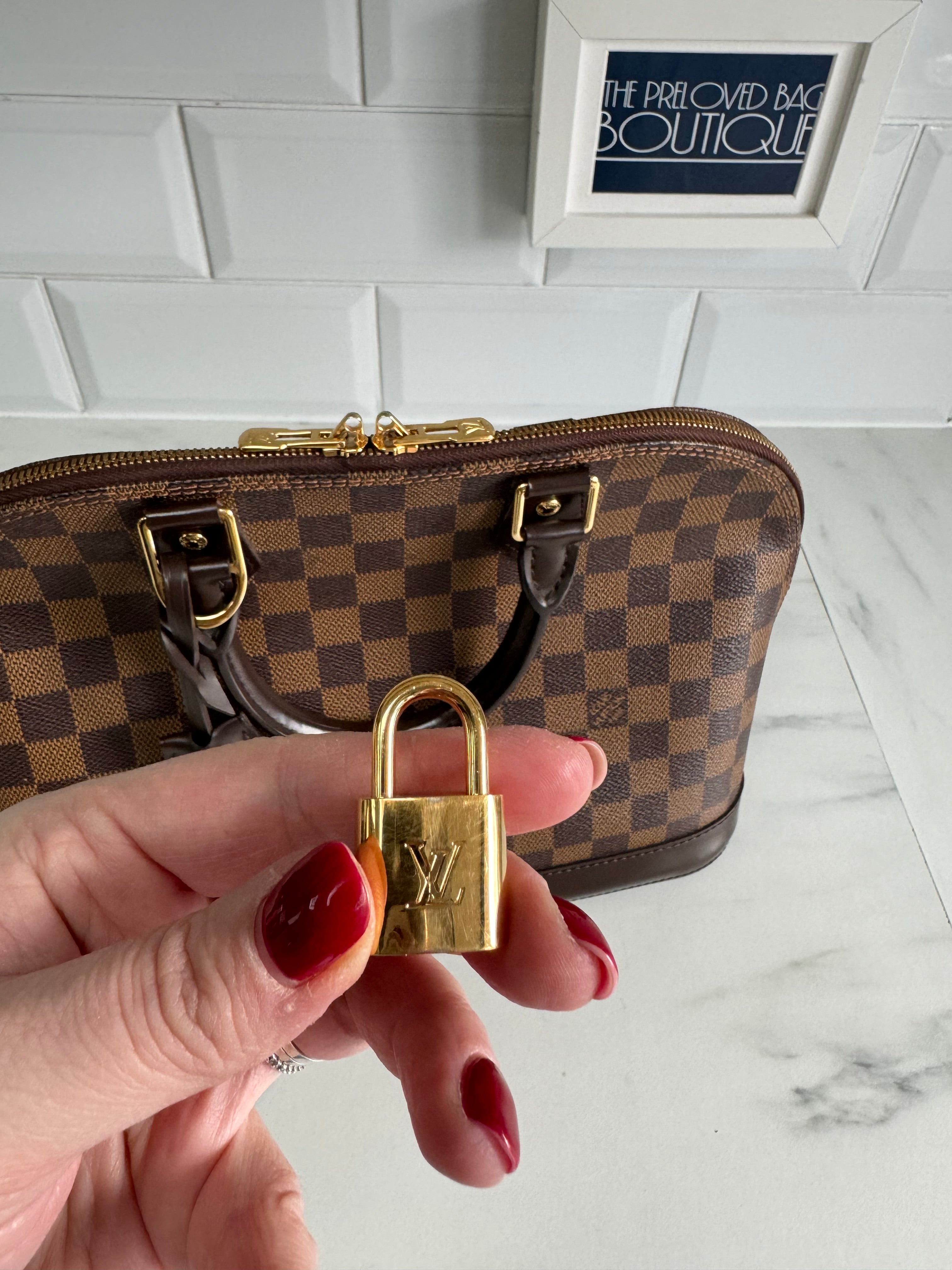 Sac alma shop pm louis vuitton