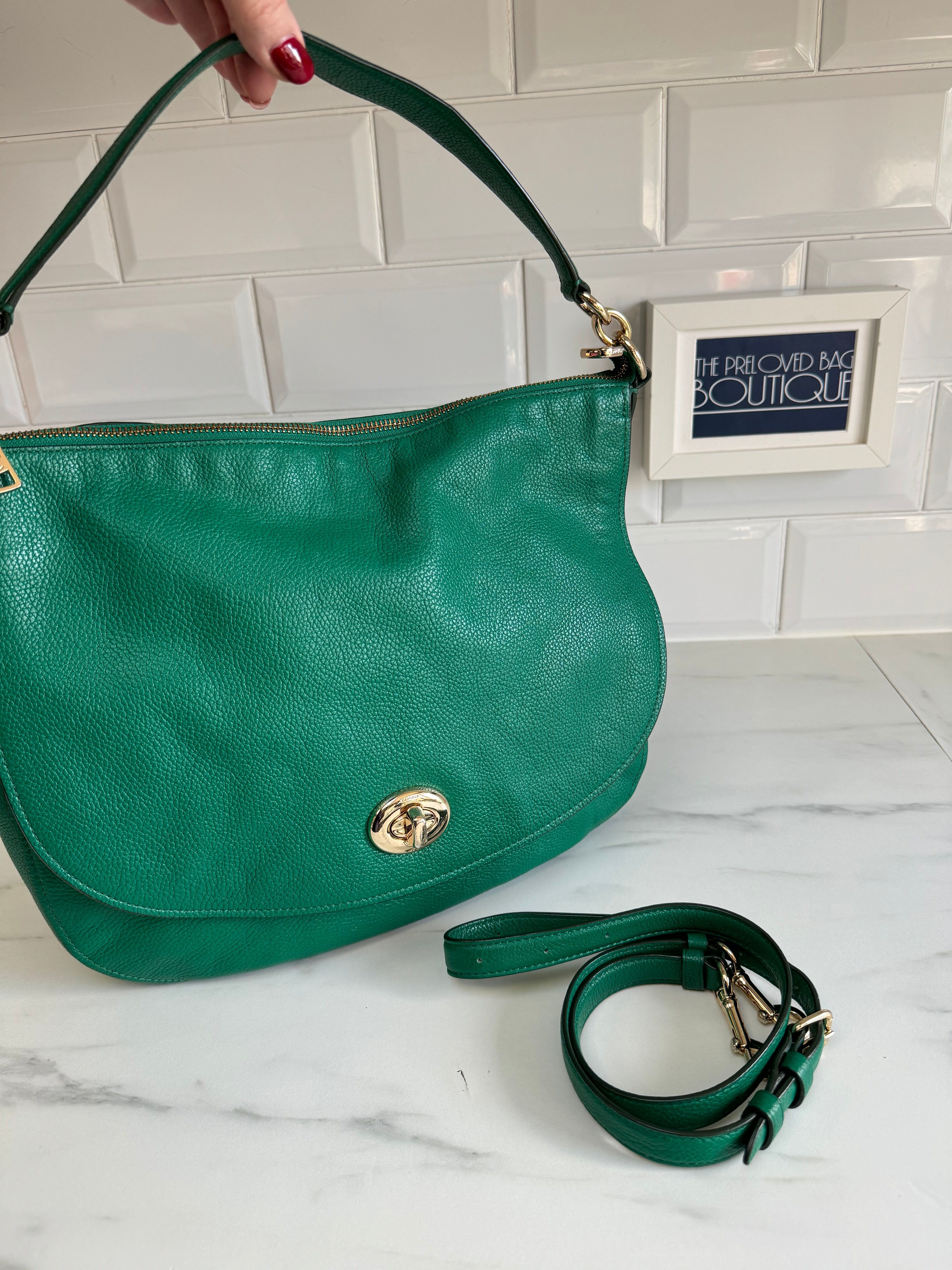 Elevate Your Style: The Coach Emerald Green Handbag