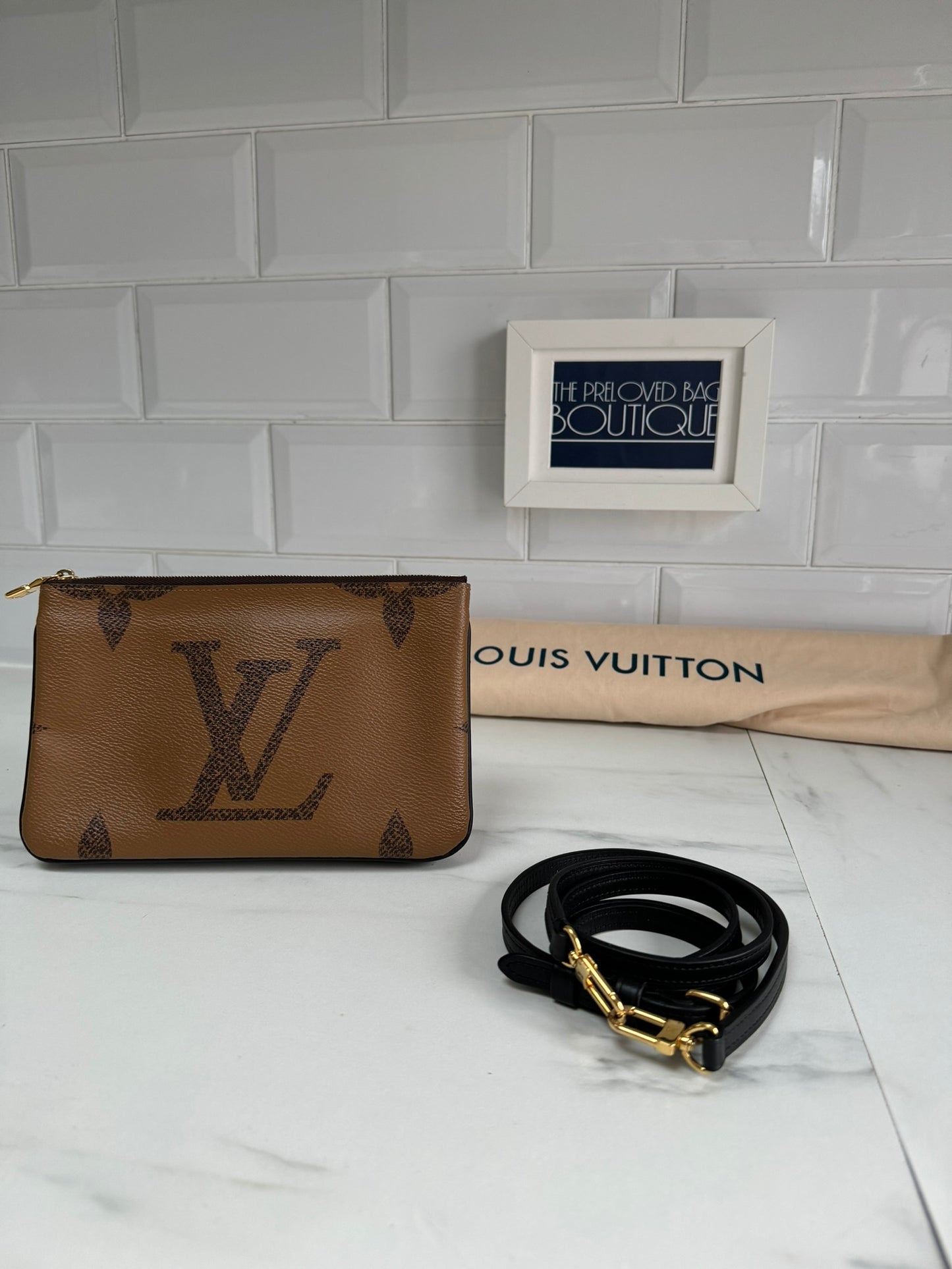 Louis Vuitton Double Zip Pochette in Giant Reverse Monogram Canvas