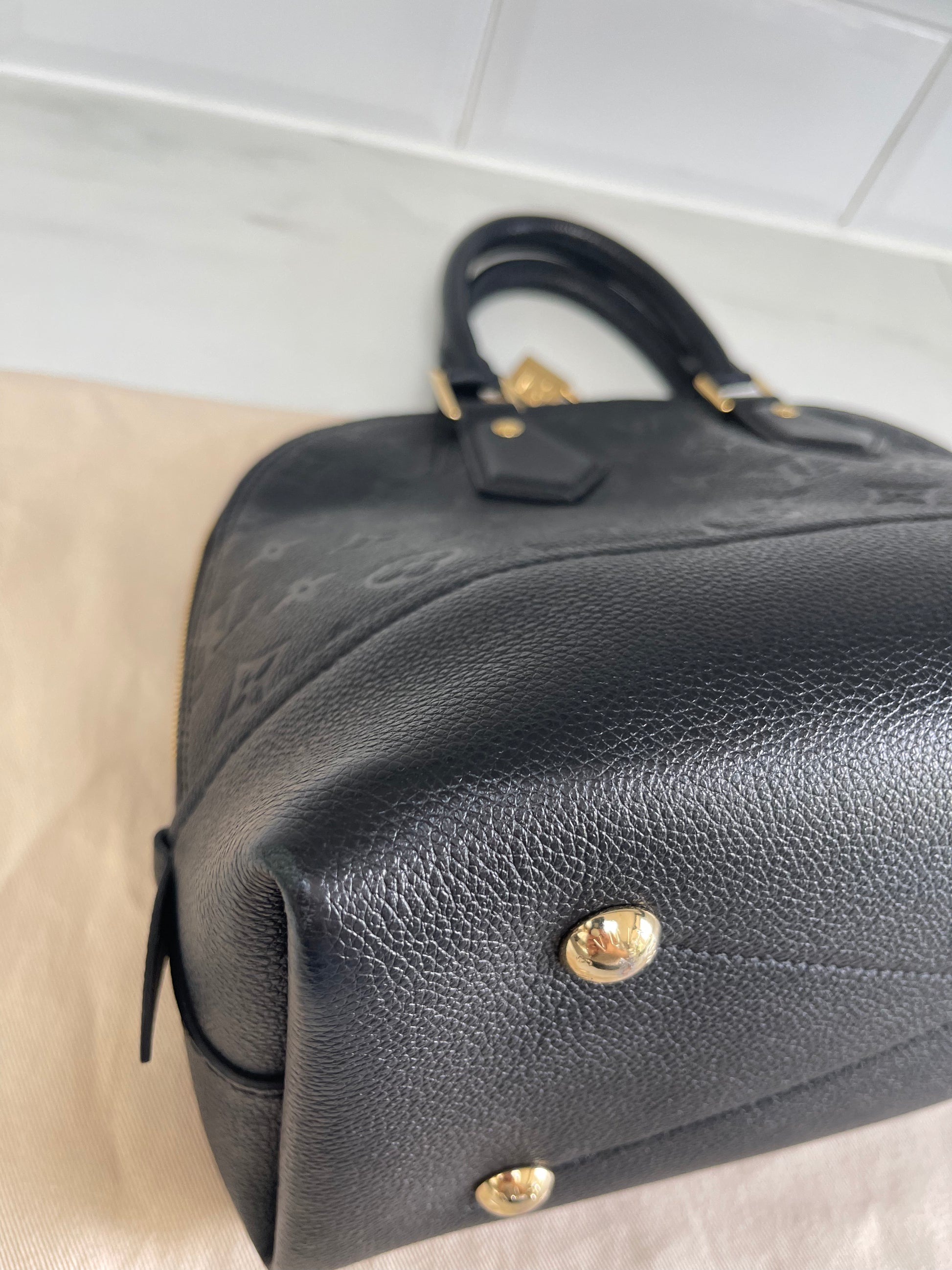 Louis Vuitton 2019 pre-owned Monogram Empreinte Neo Alma PM Handbag -  Farfetch