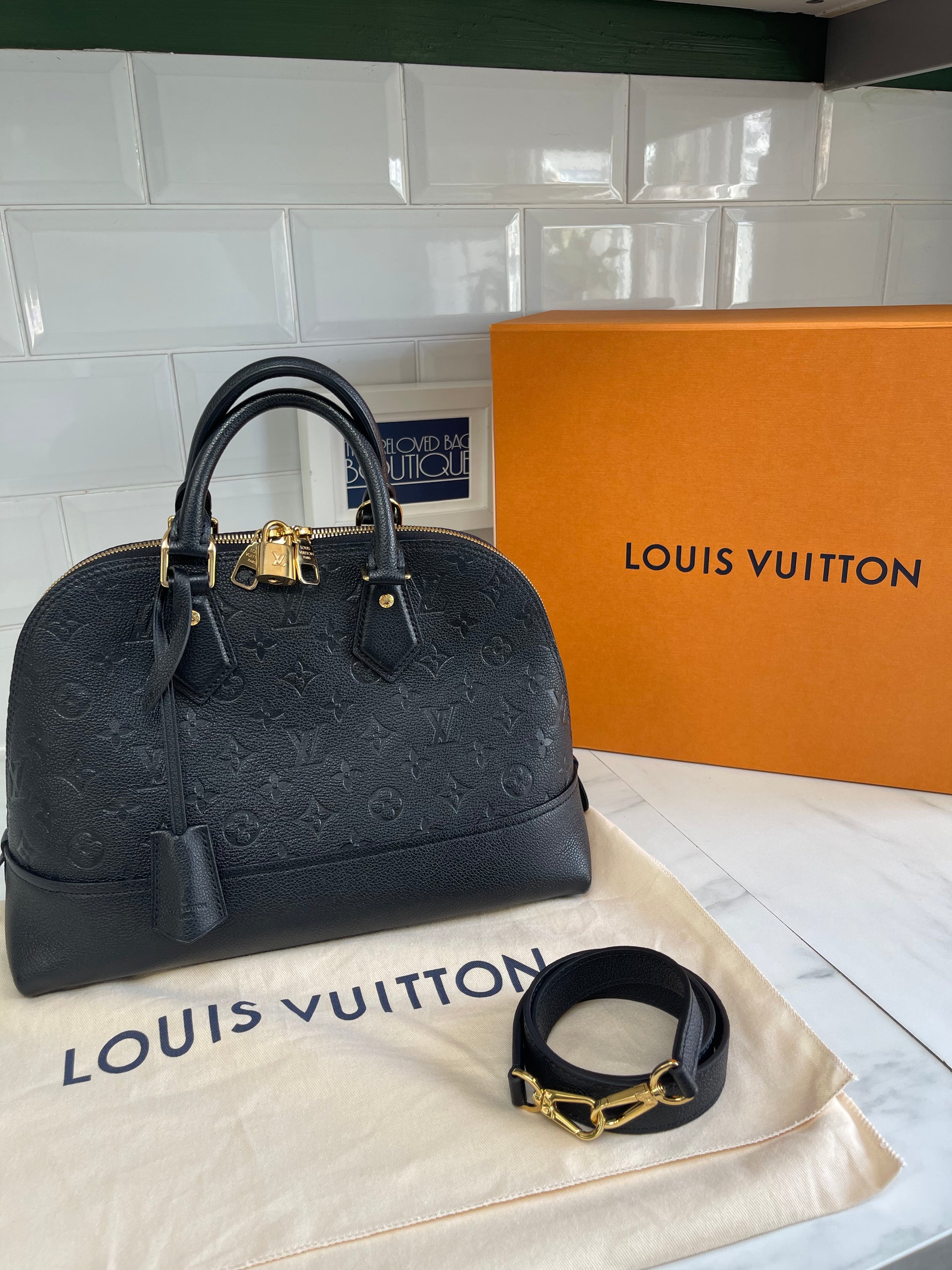 Louis Vuitton Black Monogram Empreinte Leather Double Jeu Neo Alma Bag  Louis Vuitton